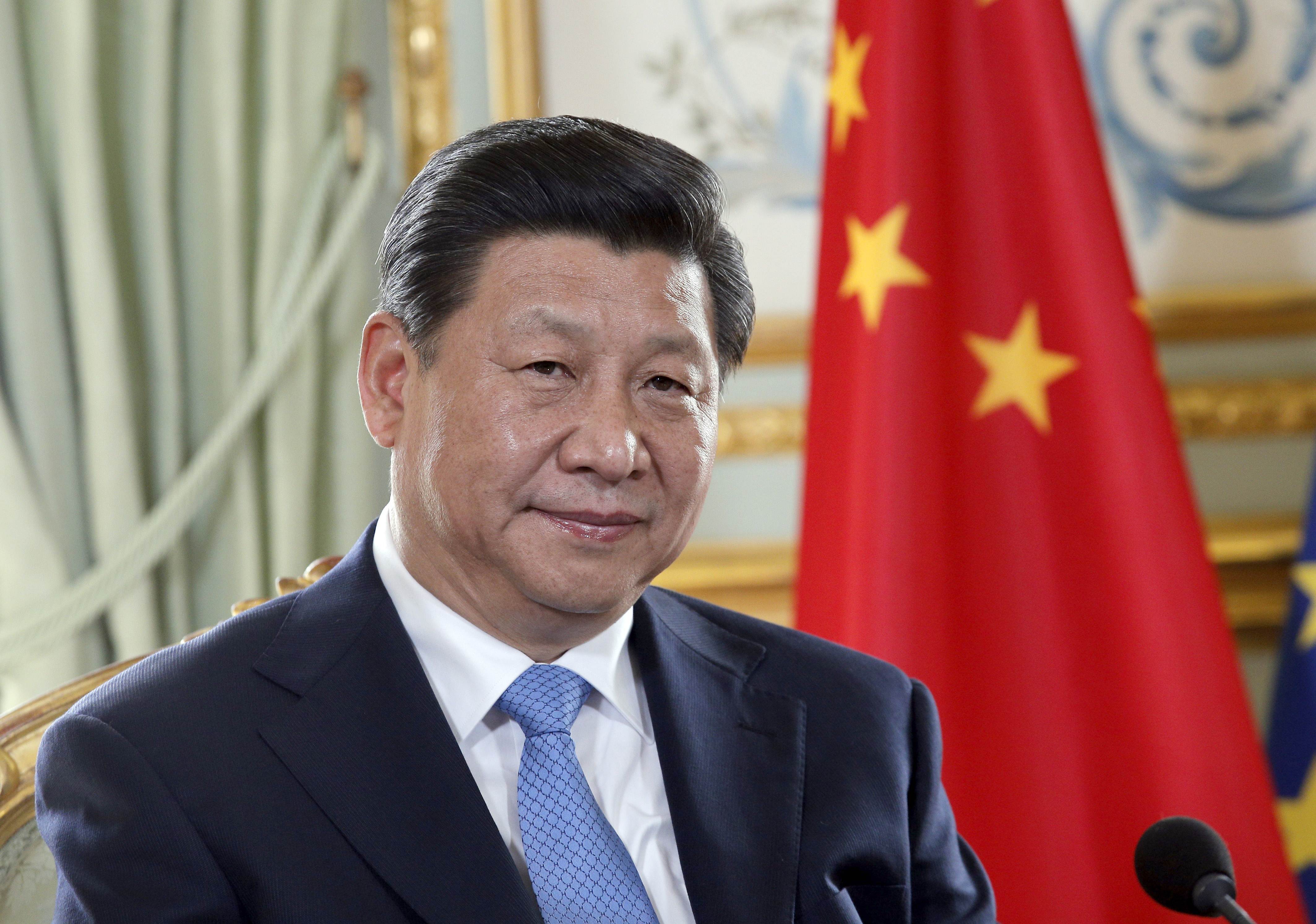 Xi